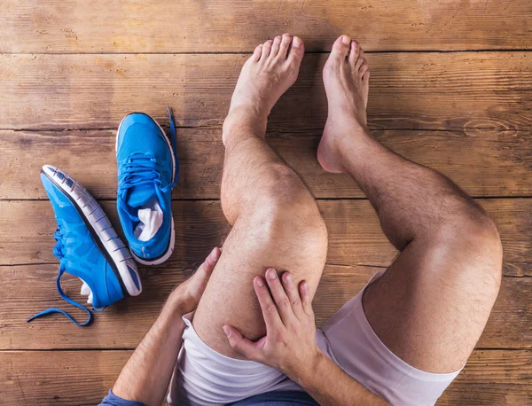 Injured runner — Stock Image Injured runner Stock Photo