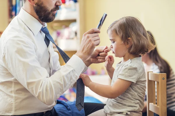 Father getting his daughter ready in a morning — Stock Photo, Image