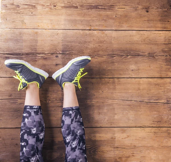 Runner zittend op een vloer — Stockfoto