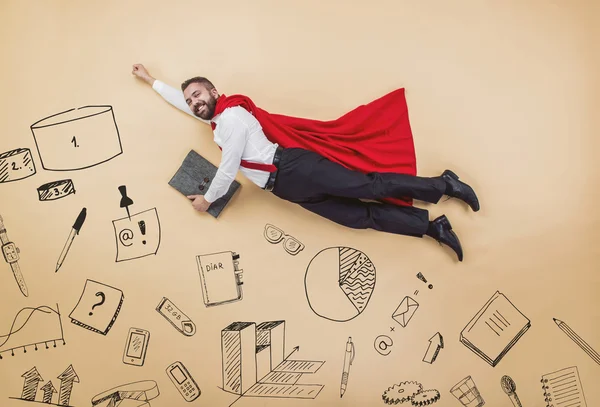 Super manager wearing a red cloak — Stock Photo, Image