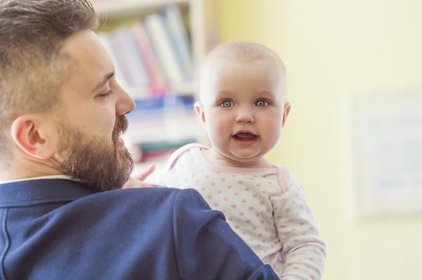 Father holding his daughter — Stock Photo, Image