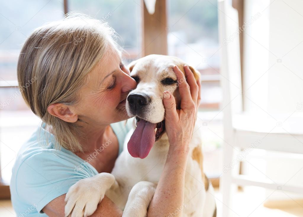 Senior woman and dog