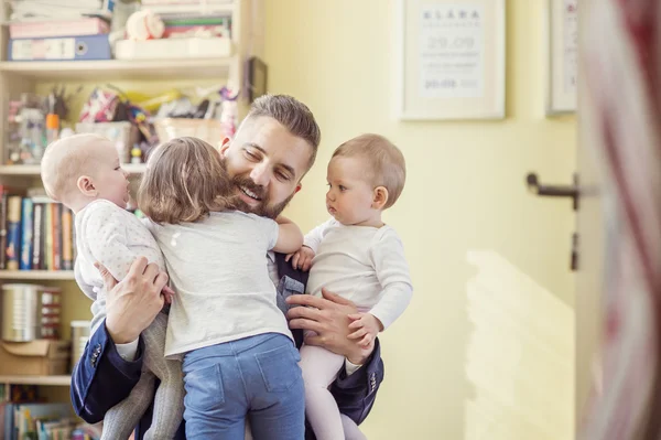 Father hugging his daughters — Stock Photo, Image