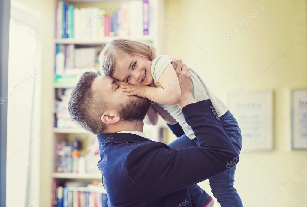 Father hugging his daughter