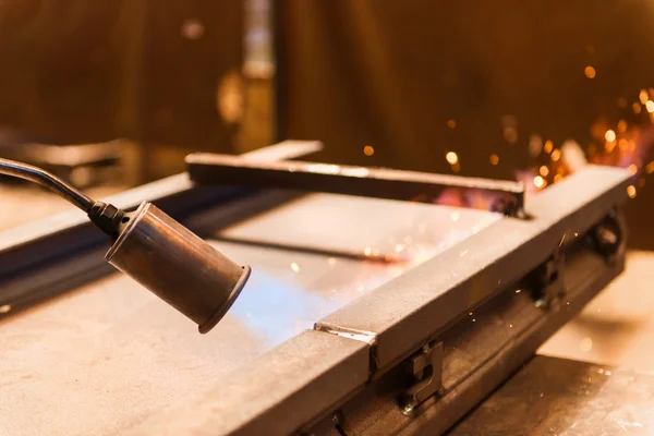 Piece of steel being prepared for welding — Stock Photo, Image