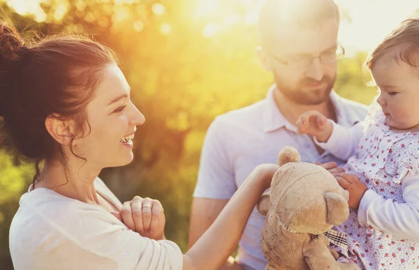 Happy family having fun in spring — Stok fotoğraf