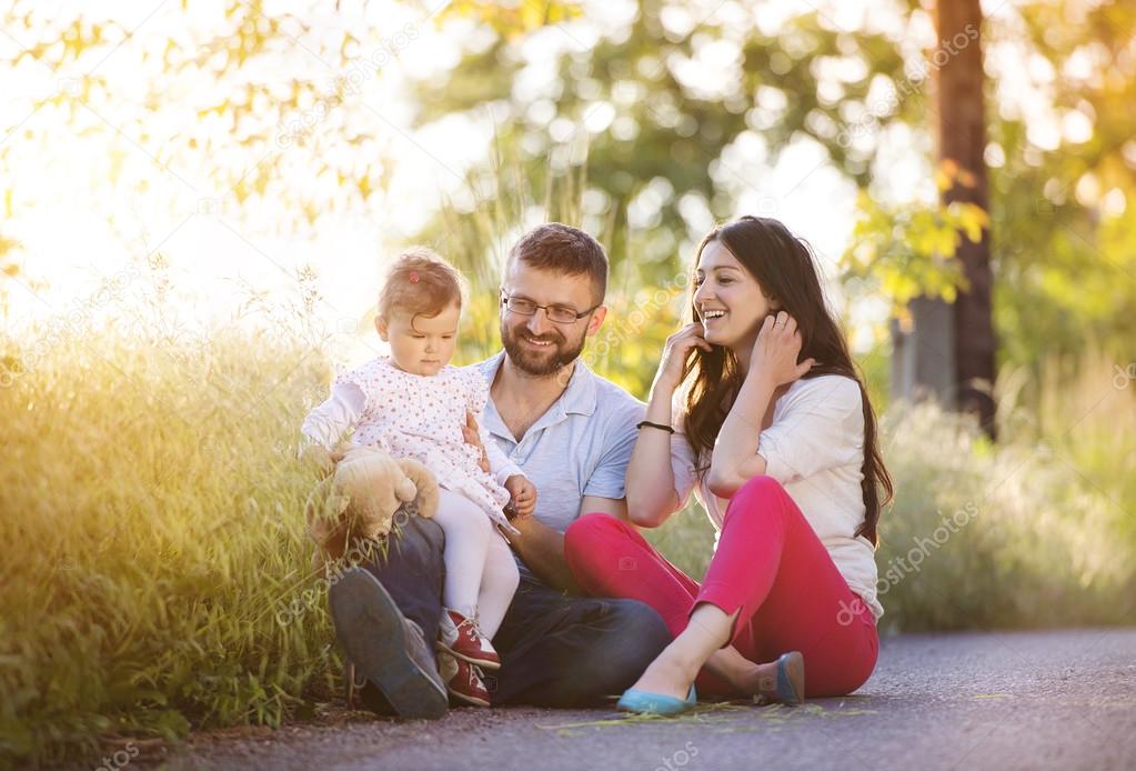 Happy family having fun in spring