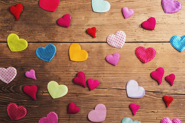 Colorful textile hearts on the floor — Stock Photo, Image