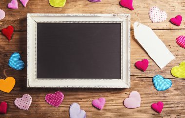 White picture frame and fabric hearts