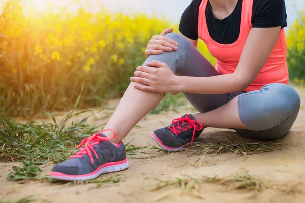 Young runner having an accident — 图库照片