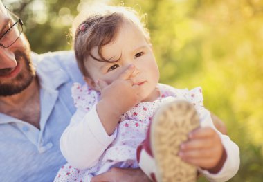 Happy father with his daughter having fun