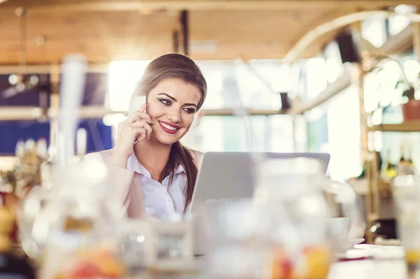 Young woman in cafe — Stock Photo, Image