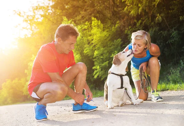 Senior couple running — Stock Photo, Image