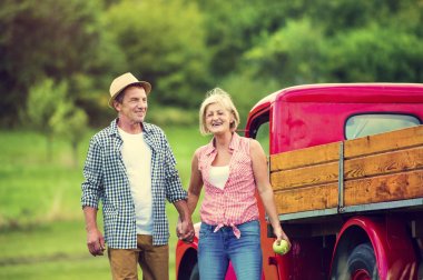 Couple with red truck
