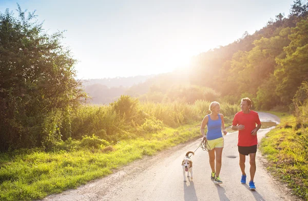 Senior couple running — Stock Photo, Image