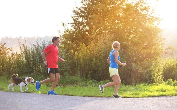 Senior couple running — Stock Photo, Image