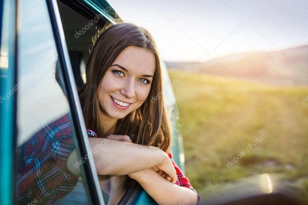 Teenage girl on road trip