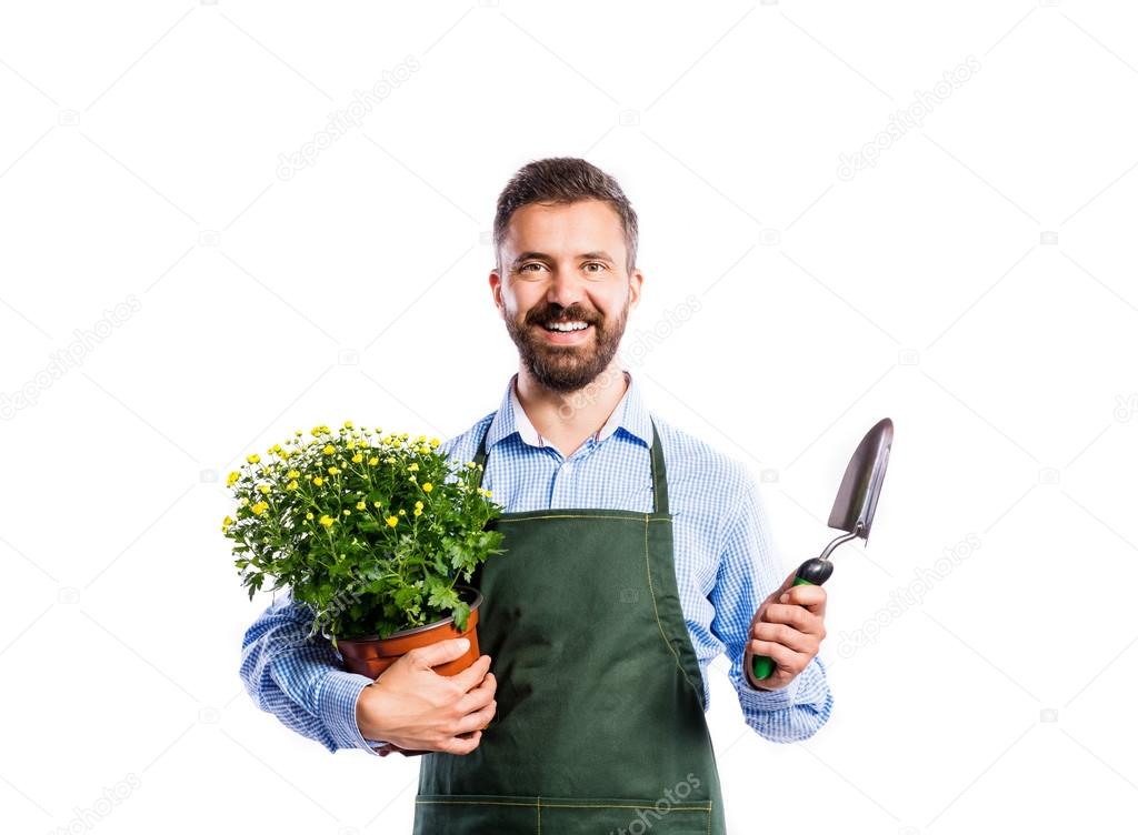 Young handsome gardener