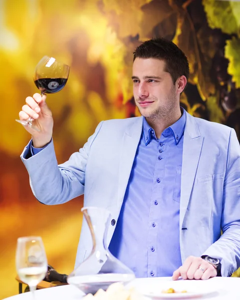 Young man in a bar — Stock Photo, Image