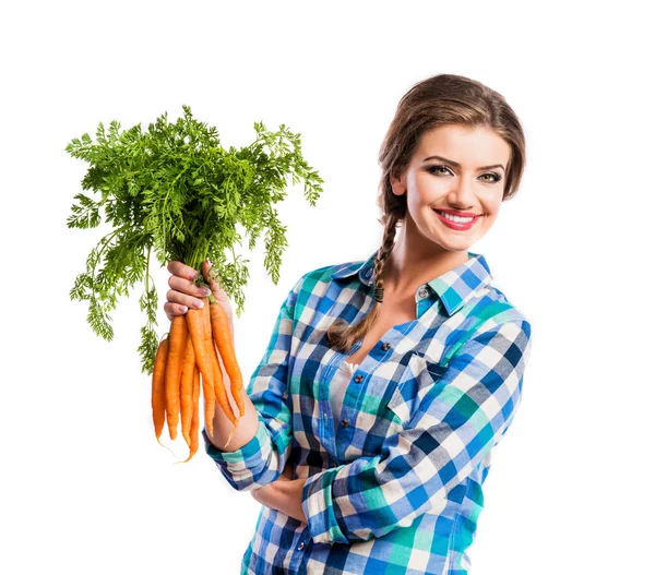 Jeune femme aux carottes — Photo