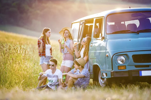 Young hipster friends on road trip