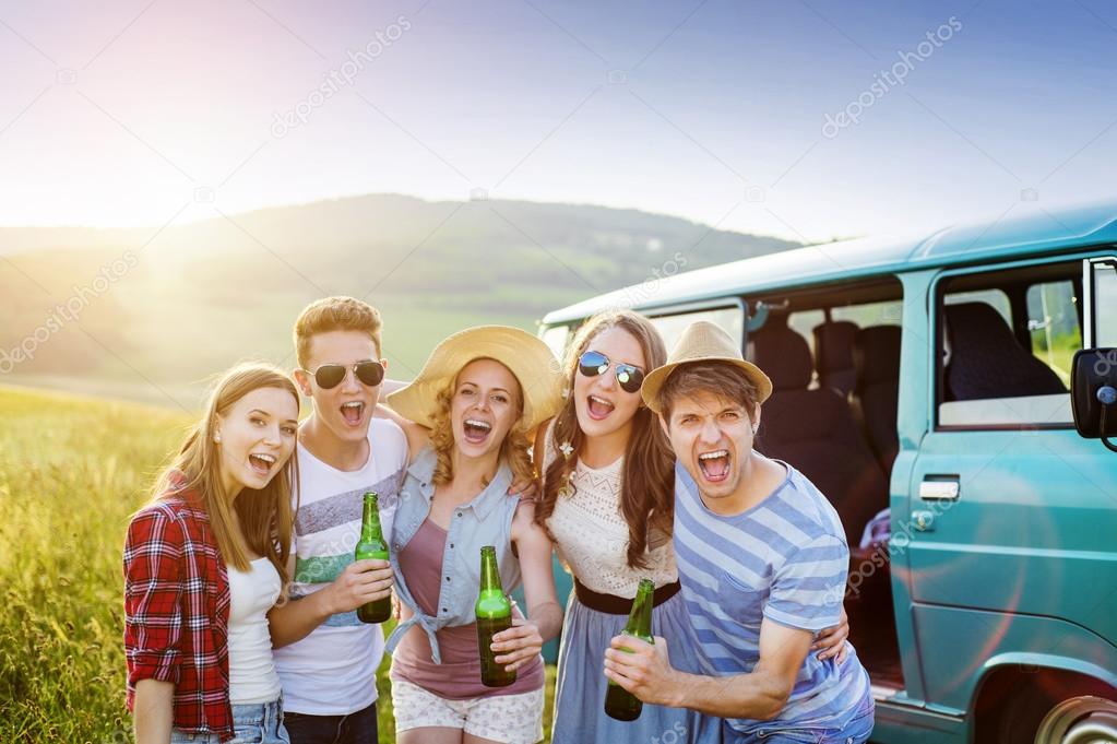 Young hipster friends on road trip