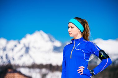 Woman running in mountains clipart