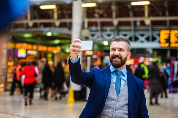 Businessman with smart phone — Stock Photo, Image