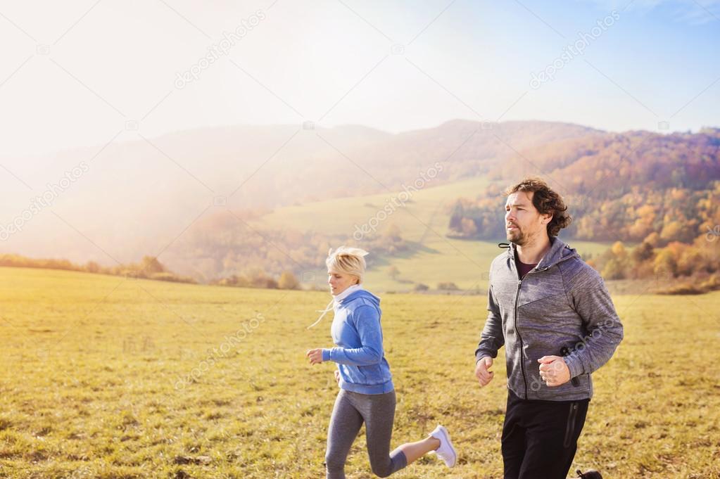 Beautiful couple running