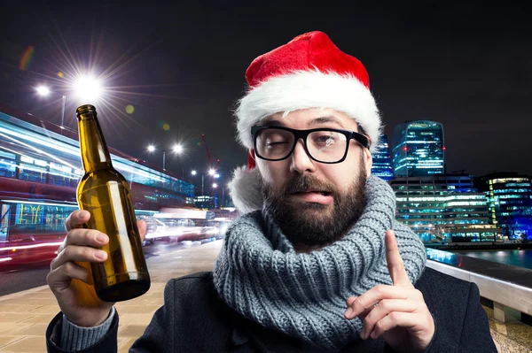 Young man with beer bottle — Stock Photo, Image