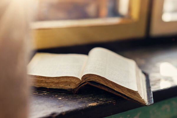 Old book on windowsill