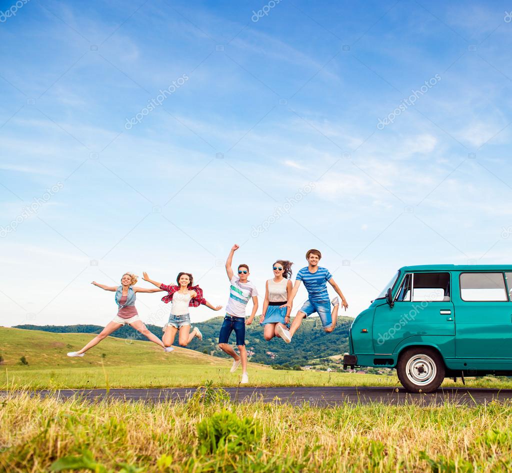 Young hipster friends on road trip