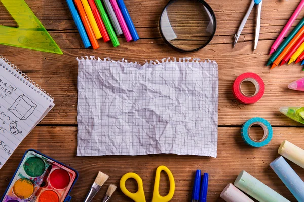 Desk, school supplies, squared paper, wooden background, copy sp — Φωτογραφία Αρχείου