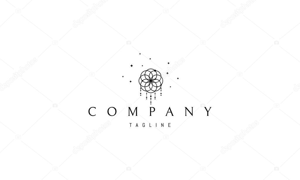 Vector logo in which an abstract image of a dreamcatcher on a background of stars.