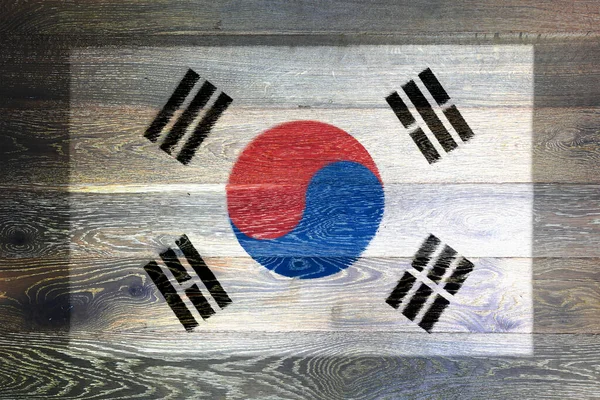 Corea del Sud bandiera su sfondo rustico vecchia superficie di legno — Foto Stock