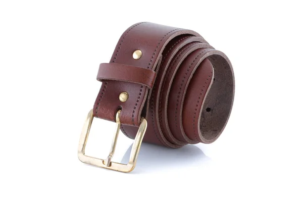 Leather belt brown with gold buckle rolled up on a white background with shadow — Stock Photo, Image