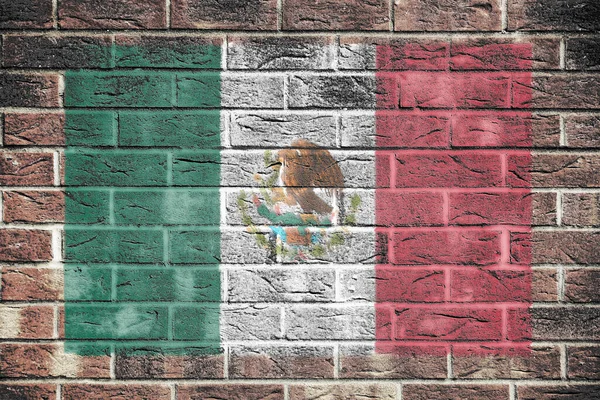 古いレンガの壁の背景にメキシコの旗 — ストック写真