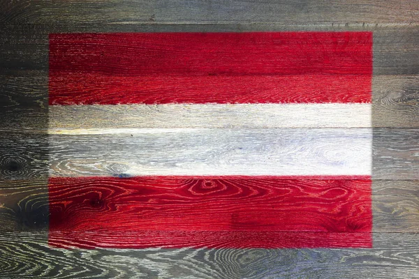 Austria bandiera su sfondo rustico vecchia superficie di legno — Foto Stock