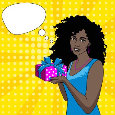 Pop sanatının neşeli Afrikalı-Amerikalı kızı elinde bir hediyeyle.