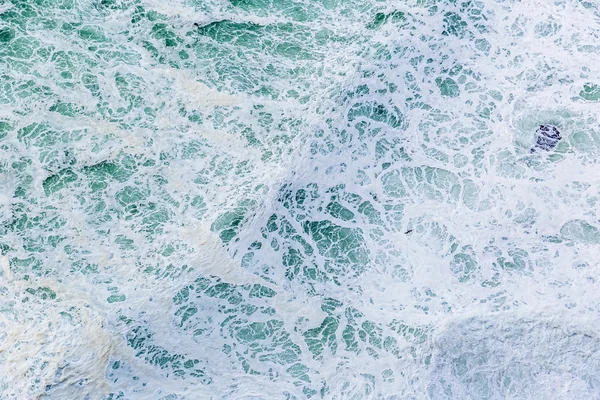 Close up photo of splashing ocean waves