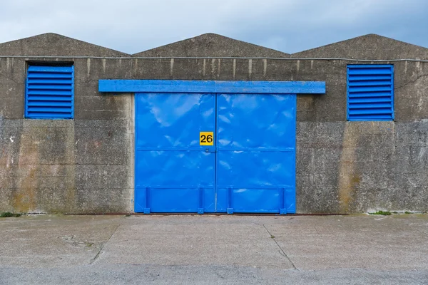 Blue warehouse door — Stock Photo, Image