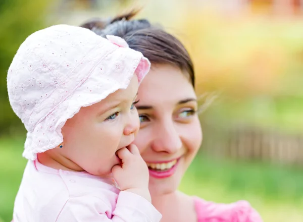 Adorable baby with her mother — Stock Photo, Image