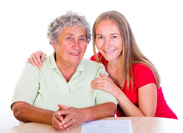 Elderly woman and her daughter — Stock Photo, Image