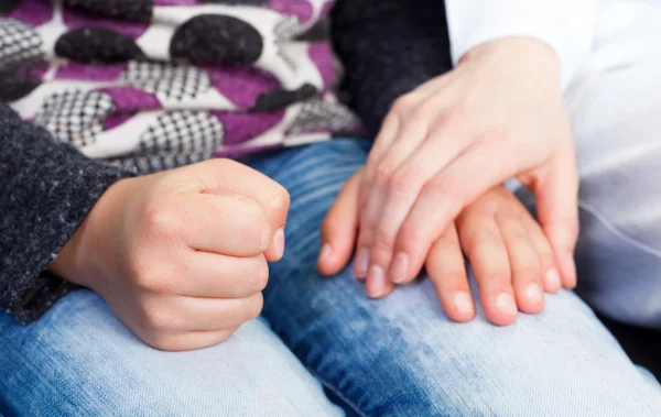 Geruststellend hand — Stockfoto