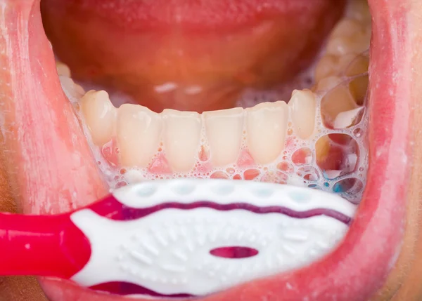 Cepillado de dientes —  Fotos de Stock
