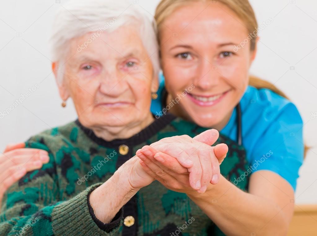 Elderly woman and young doctor