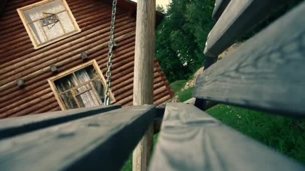 Old swing in the yard with light effect. weirdness — Stock Video