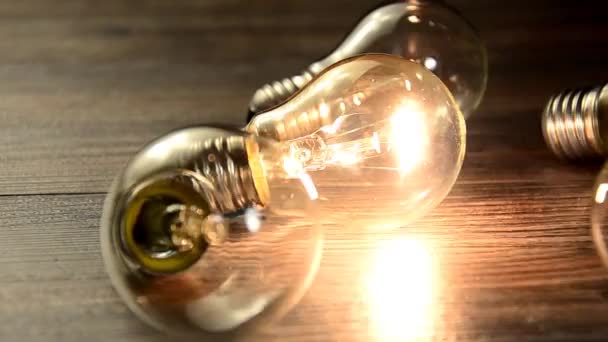 Many bulb and lights up only one. The concept of idea. The flashing bulb light Spoiled — Stock Video