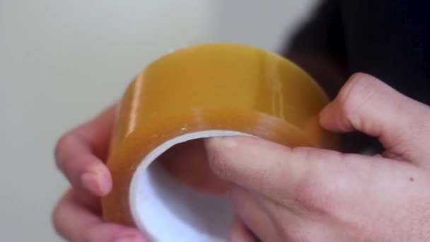 Trying Find Tip Adhesive Tape — Stock Video