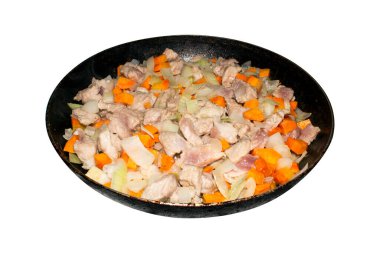 Sebzeli ve otlu kızarmış et. Sebzeli et dilimleri. Sebzeli kızarmış domuz dilimleri..